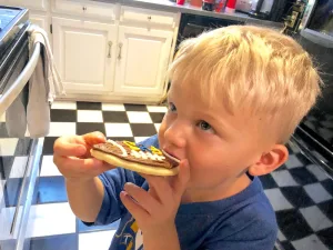 Visit Findlay Blogger Ashley shares why her family makes attending Findlay High School football games a priority - no matter the weather! • VisitFindlay.com