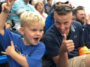 Visit Findlay Blogger Ashley shares why her family makes attending Findlay High School football games a priority - no matter the weather! • VisitFindlay.com